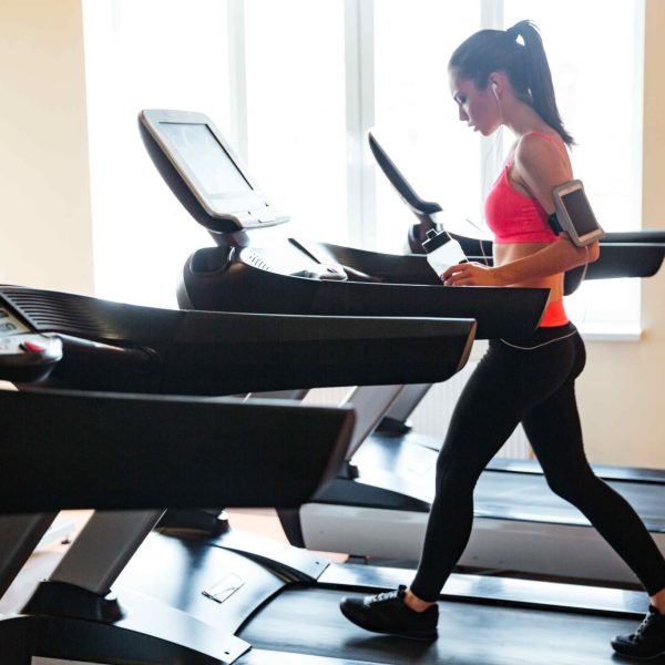 Sportswoman With Earphones And Blank Screen P Amfy